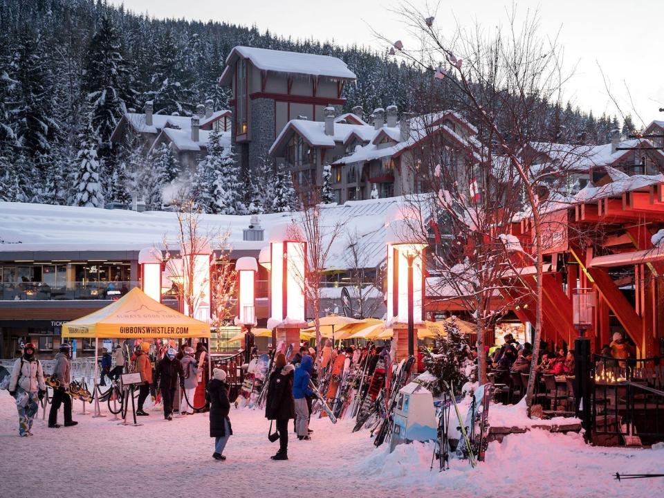 Skiers and snowboarders gather at bars after a day on the slopes.