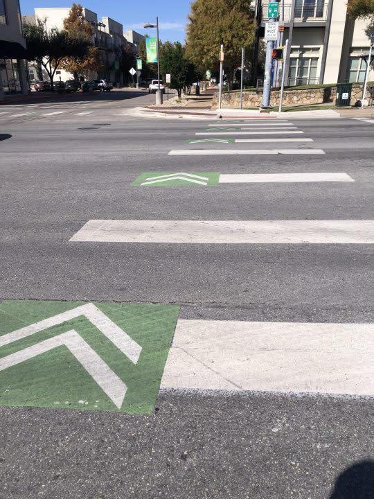 Crosswalk and green-backed chevron markings for cyclist and pedestrians at Lamar Boulevard and St Johns Avenue in Austin. (KXAN Photo/Arezow Doost)