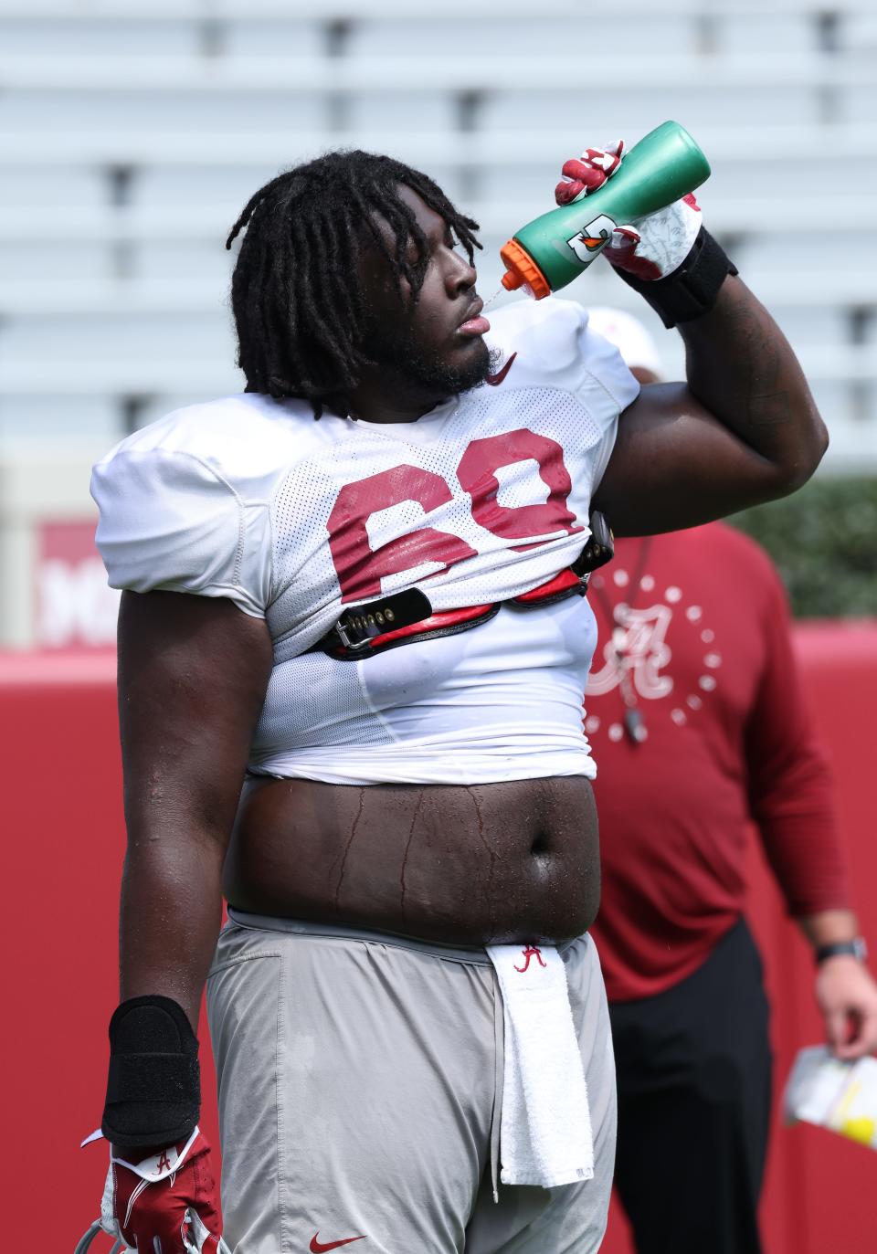 Alabama offensive lineman Terrence Ferguson II (69) takes a break during practice at Bryant-Denny Stadium in Tuscaloosa, AL on Saturday, Aug 5, 2023.