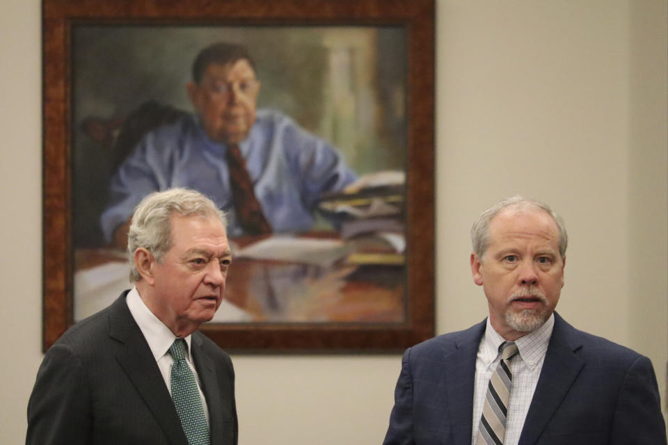 Defense attorney Dick Harpootlian speaks with prosecuting attorney Creighton Waters in Beaufort, S.C. on Friday, Nov. 17, 2023. A pretrial hearing is scheduled Friday on state charges of financial crimes against convicted murderer Alex Murdaugh. (AP Photo/James Pollard)