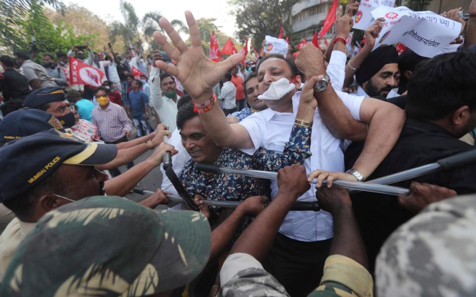 Indian police clash with protesting farmers - RAFIQ MAQBOOL/AP  