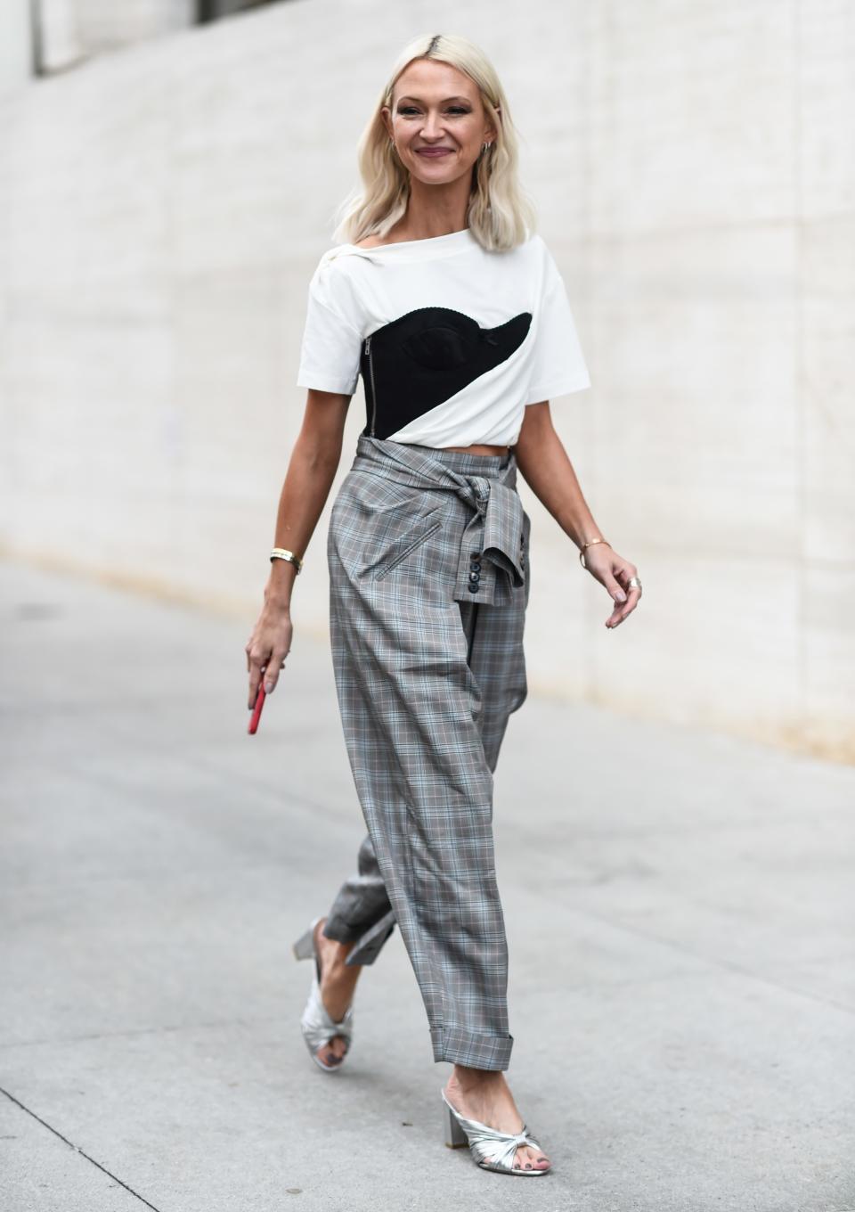 Not the buttoned-up type? Try a laid-back polished look with a pairing of plaid trousers and a graphic tee.