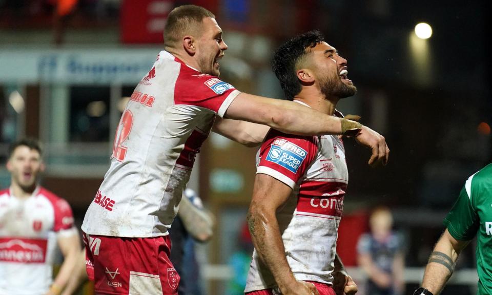 <span>Peta Hiku (right) celebrates scoring his first try for Hull KR in the Super League after signing from North Queensland Cowboys in the off-season.</span><span>Photograph: Mike Egerton/PA</span>