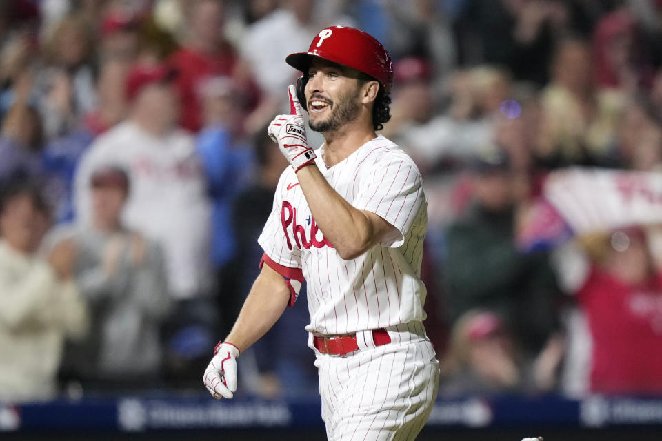 Philadelphia Phillies' Garrett Stubbs reacts after hitting a three-run home run against Pittsburgh Pirates pitcher Johan Oviedo during the fourth inning of a baseball game, Wednesday, Sept. 27, 2023, in Philadelphia. (AP Photo/Matt Slocum)