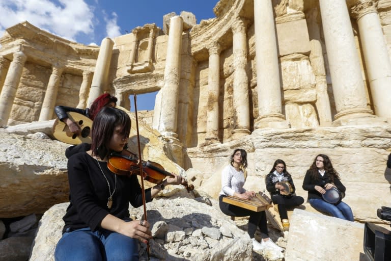 Young Syrian musicians flocked to the damaged Roman amphitheatre in Palmyra, for the press tour organised by the army on March 4, 2017