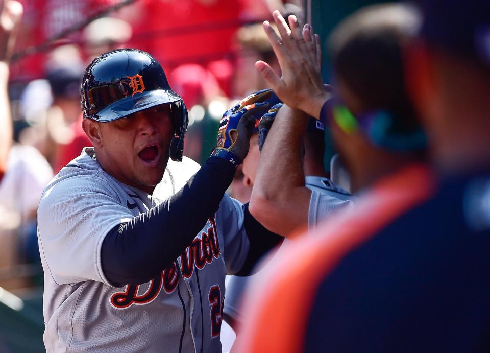 Detroit Tigers pinch hitter Miguel Cabrera (24) celebrates after scoring the game tying run during the ninth inning Aug. 25, 2021 against the St. Louis Cardinals at Busch Stadium.