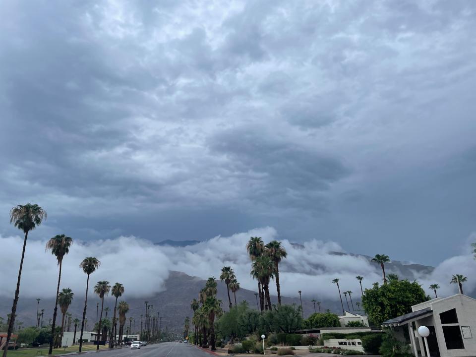 Storm clouds hover over the foothills of Palm Springs early Monday morning after some nearby areas saw up to an inch of rainfall overnight.