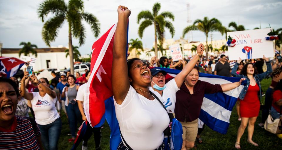 Rosa Maso chants while taking part in a march demanding freedom for the Cuban people on July 13 in downtown Fort Myers . The event, which drew about 1,000 people, was called the Walk for Cuba.