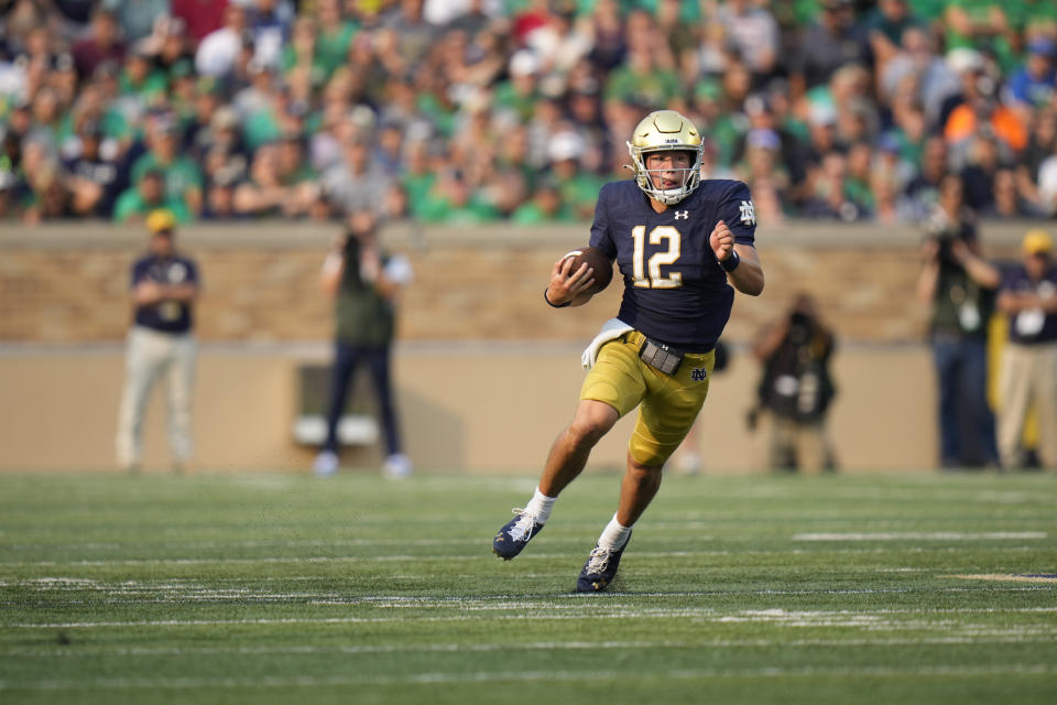 Notre Dame quarterback Tyler Buchner (12) in action against Toledo in an NCAA college football game in South Bend, Ind., Saturday, Sept. 11, 2021. Notre Dame won 32-29. (AP Photo/AJ Mast)