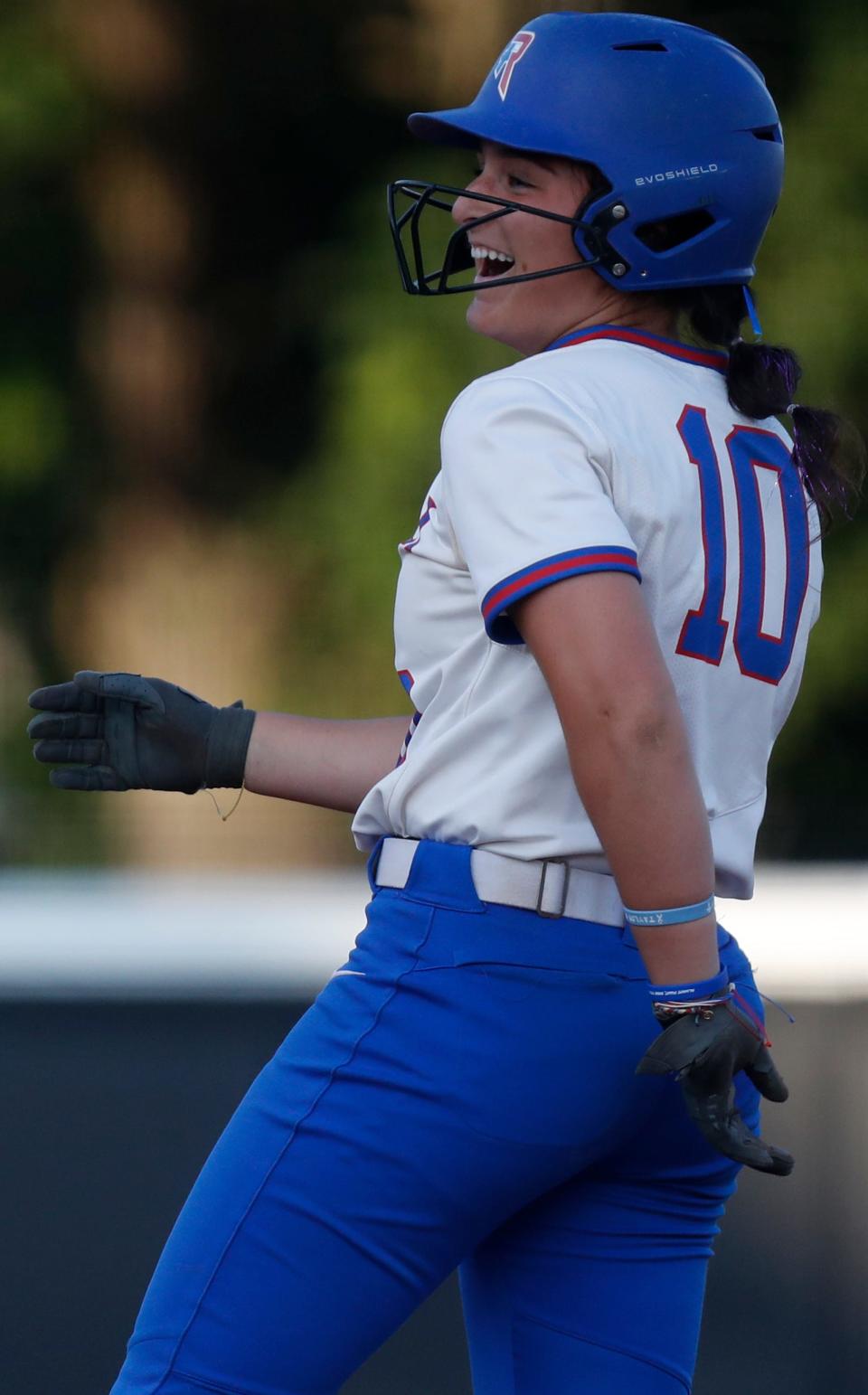 Roncalli Royals Abby Willis (10) celebrates after getting on base during the IHSAA Class 4A Softball State Final against the Penn Kingsmen, Saturday, June 10, 2023, at Purdue University’s Bittinger Stadium in West Lafayette, Ind. Penn won 2-1 in nine innings.