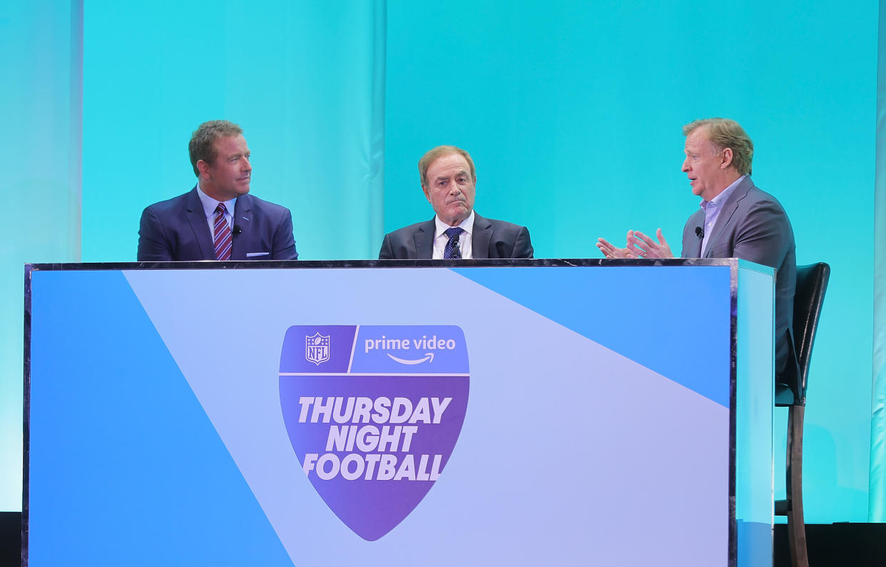 Kirk Herbstreit, Al Michaels and Roger Goodell speak on stage during Amazon Presentation. Michaels and Herbstreit will call Thursday night NFL games on Amazon Prime. (Michael Loccisano/Getty Images for Amazon)