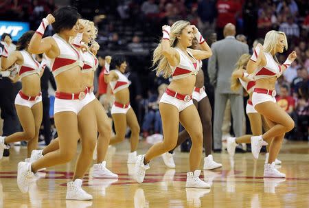 Nov 2, 2015; Houston, TX, USA; The Houston Rocket Power Dancers perform during an Oklahoma City Thunder timeout in the third quarter at Toyota Center. Rocket won 110 to 105. Mandatory Credit: Thomas B. Shea-USA TODAY Sports