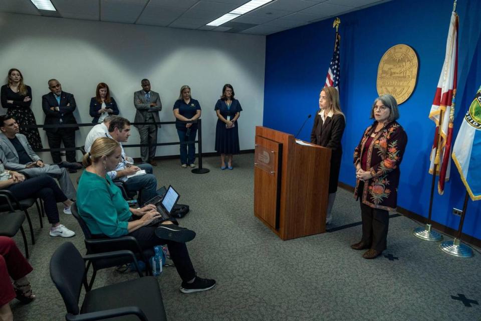 Miami-Dade Mayor Daniella Levine Cava, right, and County Commissioner Raquel Regalado, at the podium, speak to reporters during a press conference on Thursday’s lease termination for the Miami Seaquarium and a demand that the marine theme park vacate its county premises no later than April 21.