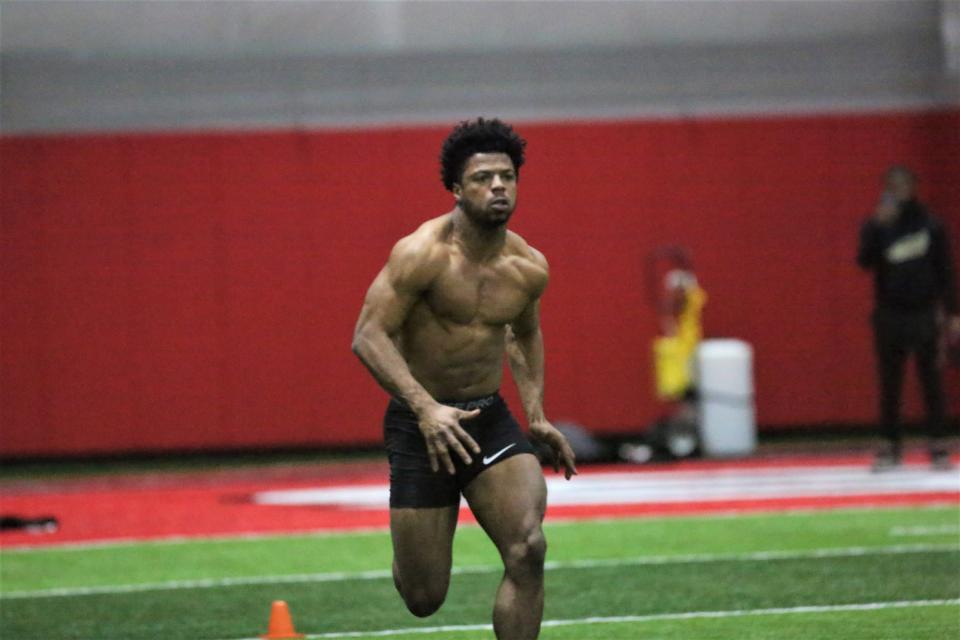 Ball State football safety Jaquan Amos runs the 40-yard dash during the program's Pro Day at the Scheumann Family Indoor Practice Center on Monday, March 27, 2023.