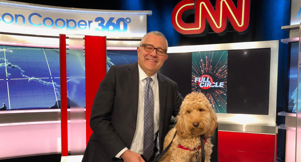 Jeffrey Toobin pictured on the CNN set with his dog.