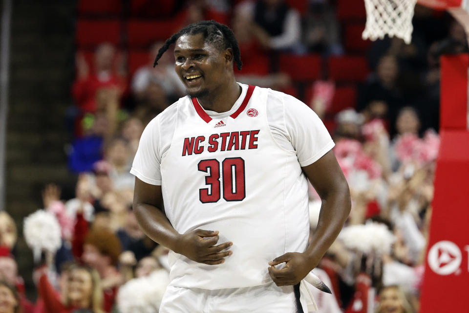 FILE - North Carolina State's D.J. Burns Jr. (30) celebrates a basket against Duke during the first half of an NCAA college basketball game in Raleigh, N.C., Jan. 4, 2023. The North Carolina State Wolfpack will try to return to the NCAA Tournament for the second straight season. (AP Photo/Karl B DeBlaker, File)