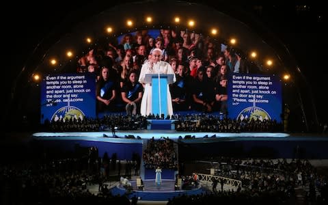 Pope Francis speaks to the audience at Croke Park Stadium in Dublin, during the Festival of Families event - Credit: Brian Lawless/PA