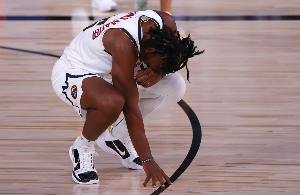 Aug 6, 2020; Lake Buena Vista, Florida, USA; Tyler Cook #25 of the Denver Nuggets reacts to their 125-115 loss to the Portland Trail Blazers at Visa Athletic Center at ESPN Wide World Of Sports Complex on August 06, 2020 in Lake Buena Vista, Florida. 