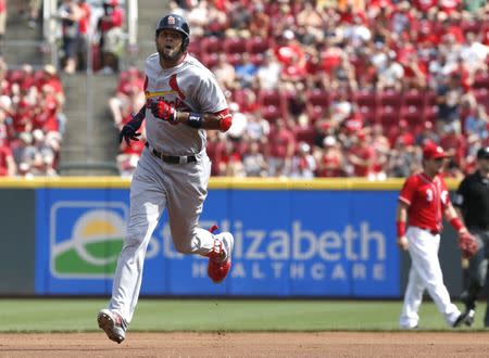 Jun 9, 2018; Cincinnati, OH, USA; St. Louis Cardinals first baseman Jose Martinez (38) rounds the bases after hitting a solo home run against the Cincinnati Reds during the first inning at Great American Ball Park. Mandatory Credit: David Kohl-USA TODAY Sports