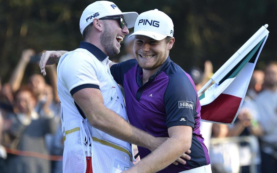 Jonathan Bell (left) and Tyrrell Hatton celebrate in Monza after clinching the Italian Open - ANSA