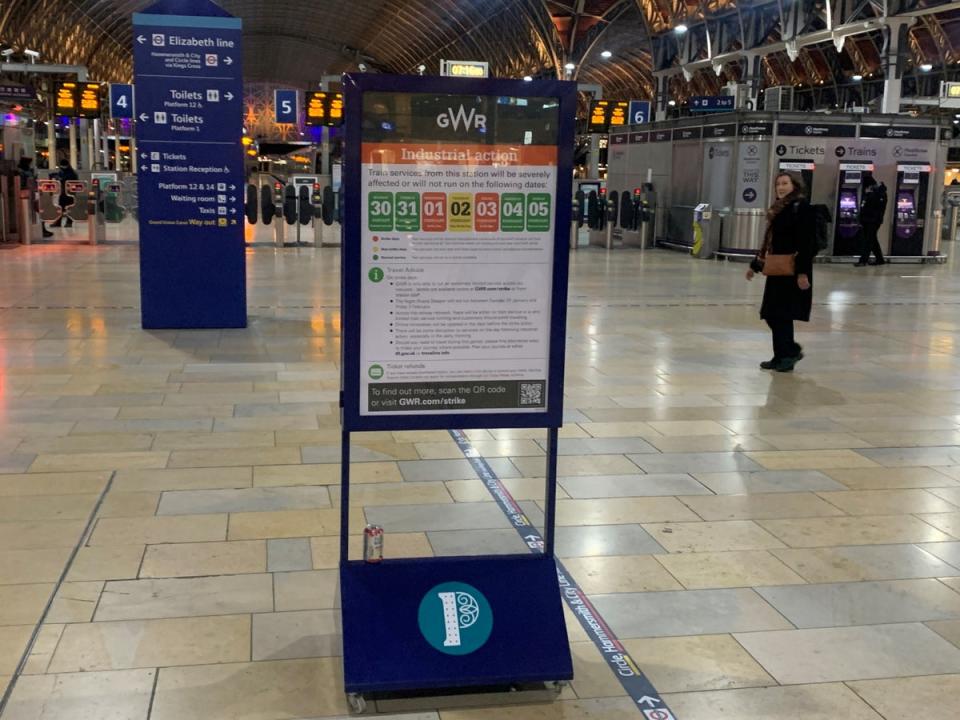 A notice on display showing dates of industrial action at Paddington Station (PA)