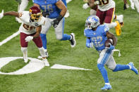 Detroit Lions running back D'Andre Swift (32) rushes during the first half of an NFL football game against the Washington Football Team, Sunday, Nov. 15, 2020, in Detroit. (AP Photo/Carlos Osorio)