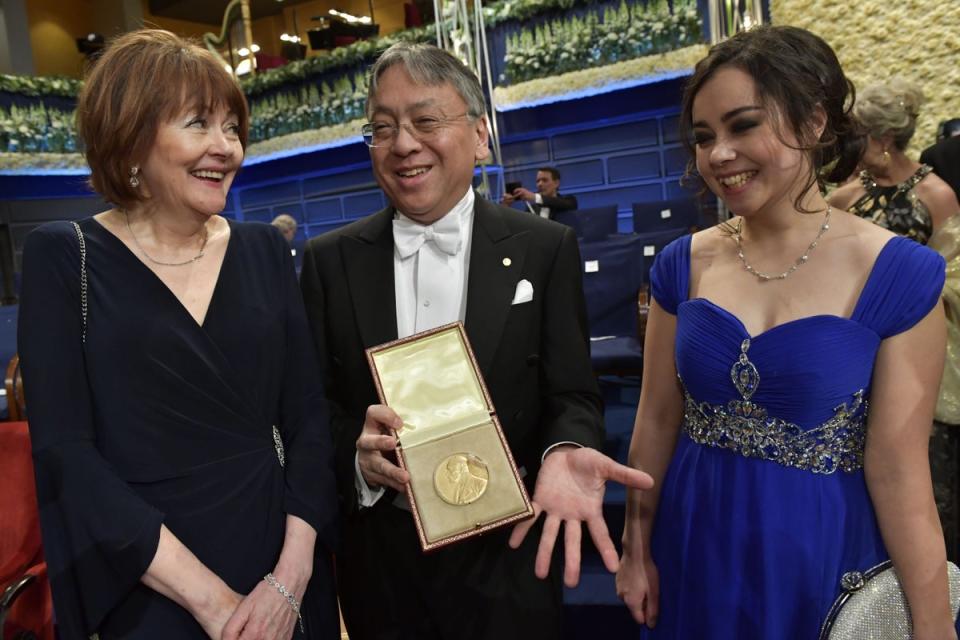 Kazuo Ishiguro with wife Lorna Mac Dougall, left, and daughter Naomi Ishiguro after the Nobel Prize Award Ceremony at the Stockholm Concert Hall in 2017 (AFP via Getty Images)