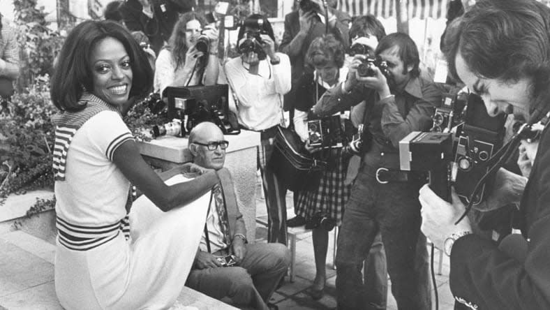 Singer Diana Ross sits in front of a bank of press photographers at a press conference to promote her film “Lady Sings the Blues,” on Sept. 14, 1973, at the Inn on the Park in London. (Photo by Monti Spry/Central Press/Getty Images)