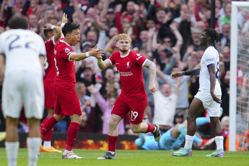 Liverpool's Harvey Elliott celebrates scoring his side's 4th goal during the English Premier League soccer match between Liverpool and Tottenham Hotspur at Anfield Stadium in Liverpool, England, Sunday, May 5, 2024. (AP Photo/Jon Super)