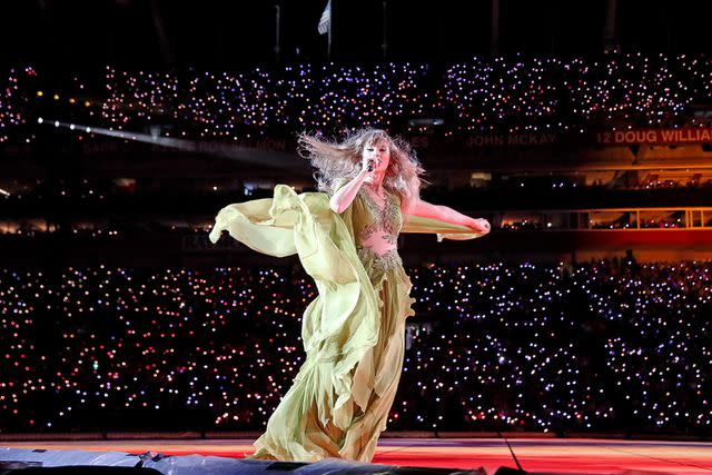 <p>Octavio Jones/TAS23/Getty </p> Taylor Swift performing at the Eras Tour