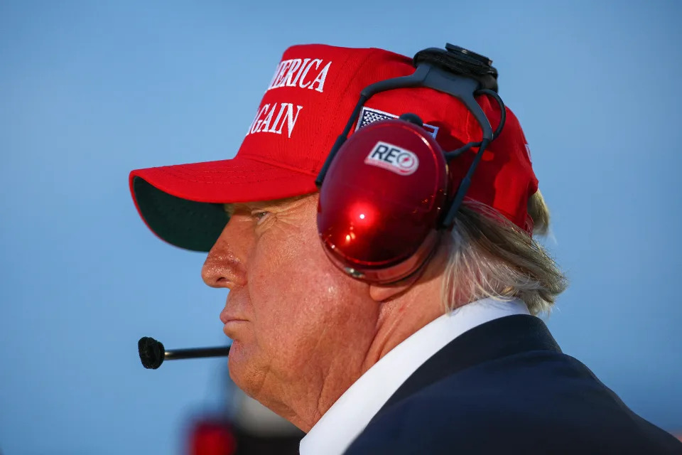 Former President Donald Trump campaigns at a NASCAR race on May 26, 2024, in Concord, N.C.