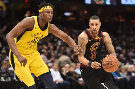 Apr 18, 2018; Cleveland, OH, USA; Cleveland Cavaliers guard George Hill (3) drives to the basket against Indiana Pacers center Myles Turner (33) during the second half in game two of the first round of the 2018 NBA Playoffs at Quicken Loans Arena. Mandatory Credit: Ken Blaze-USA TODAY Sports