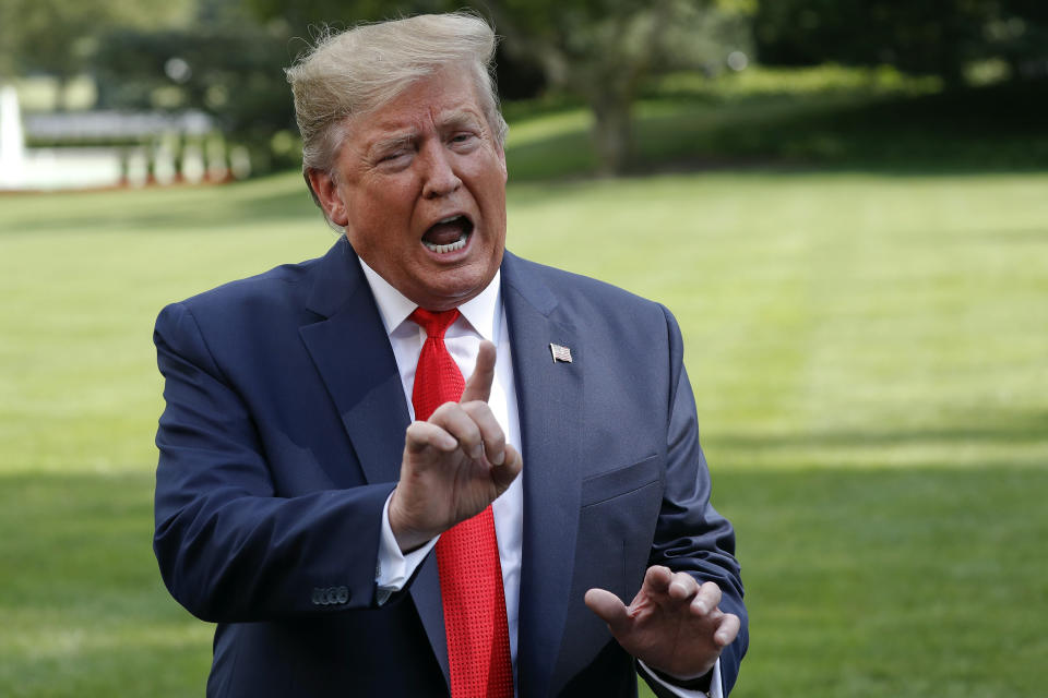 President Trump speaks to reporters on the South Lawn of the White House Wednesday. (AP Photo/Pablo Martinez Monsivais) 