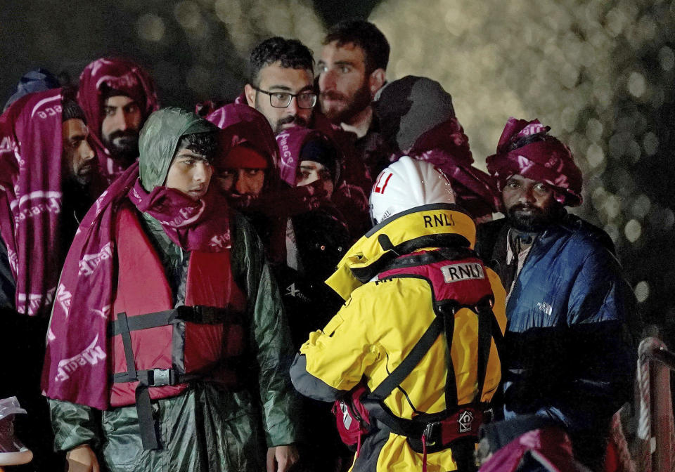 A group of people thought to be migrants are brought in to Dover, England by the RNLI, following a small boat incident in the English Channel, Thursday Nov. 25, 2021. On Wednesday around 30 migrants bound for Britain died when their boat sank in the English Channel, in what France’s interior minister called the biggest migration tragedy on the dangerous crossing to date. (Gareth Fuller/PA via AP)