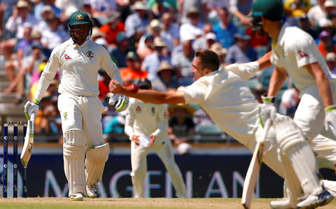 Craig Overton dives but fails to take a catch - Credit: Reuters