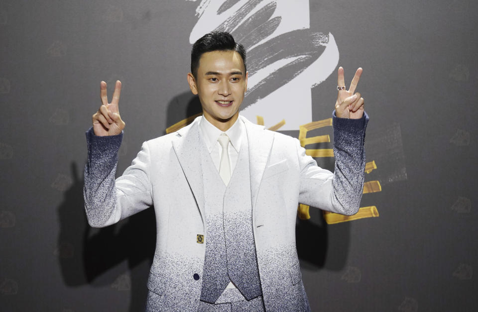 Taiwanese actor Liu Kuan-ting arrives at the 57th Golden Horse Awards in Taipei, Taiwan, Saturday, Nov. 21, 2020. Liu is nominated for Best Leadting Actor for the film "My Missing Valentine" at this year's Golden Horse Awards. (AP Photo/ Billy Dai)