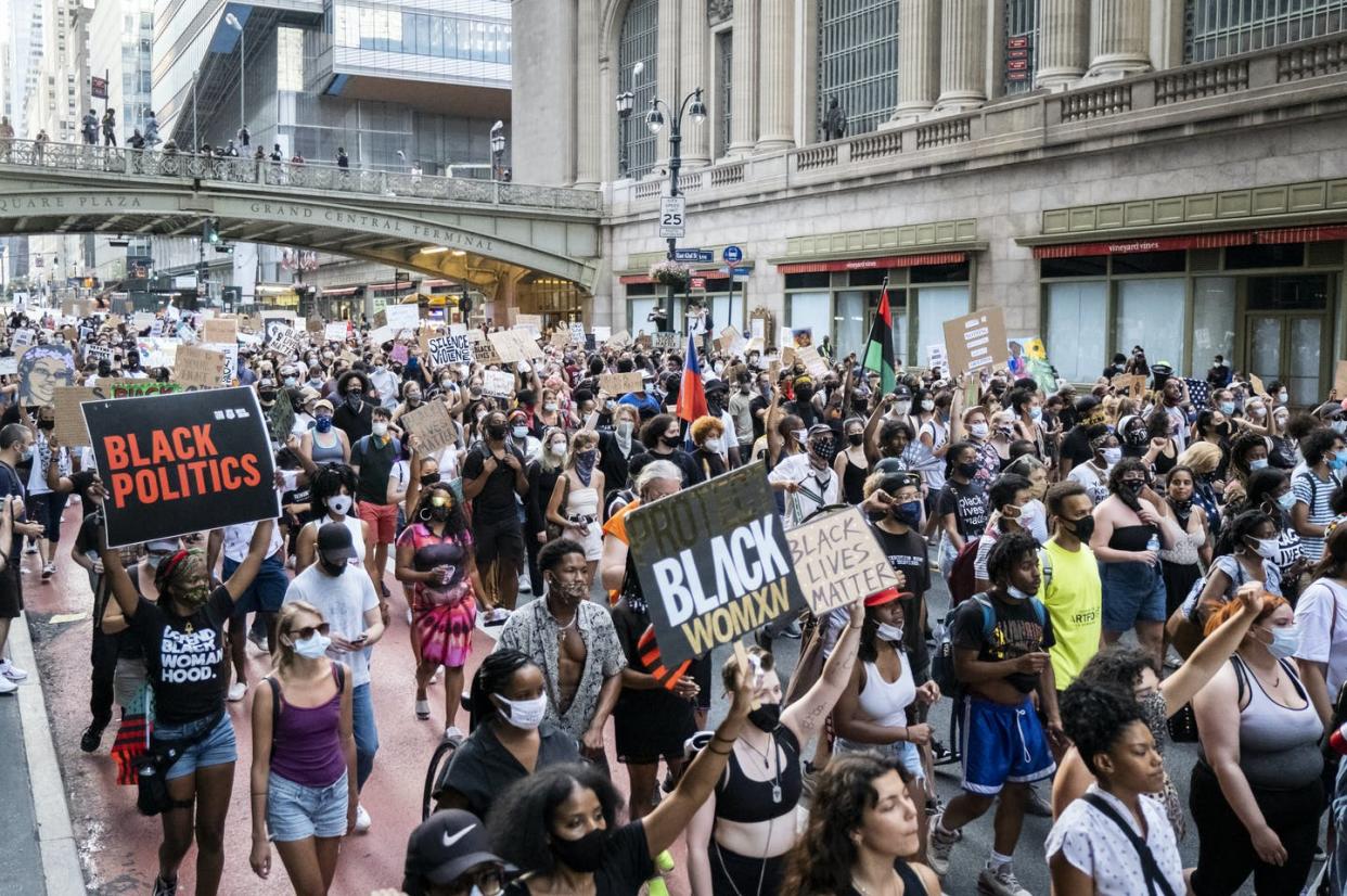 <span class="caption">These people are protesting because they are tired, because they are worn out, because they are exhausted by violence against themselves and their communities.</span> <span class="attribution"><a class="link " href="https://www.gettyimages.com/detail/news-photo/hundreds-of-protesters-carrying-signs-walk-past-grand-news-photo/1259608517" rel="nofollow noopener" target="_blank" data-ylk="slk:Ira L. Black/Corbis via Getty Images;elm:context_link;itc:0;sec:content-canvas">Ira L. Black/Corbis via Getty Images</a></span>