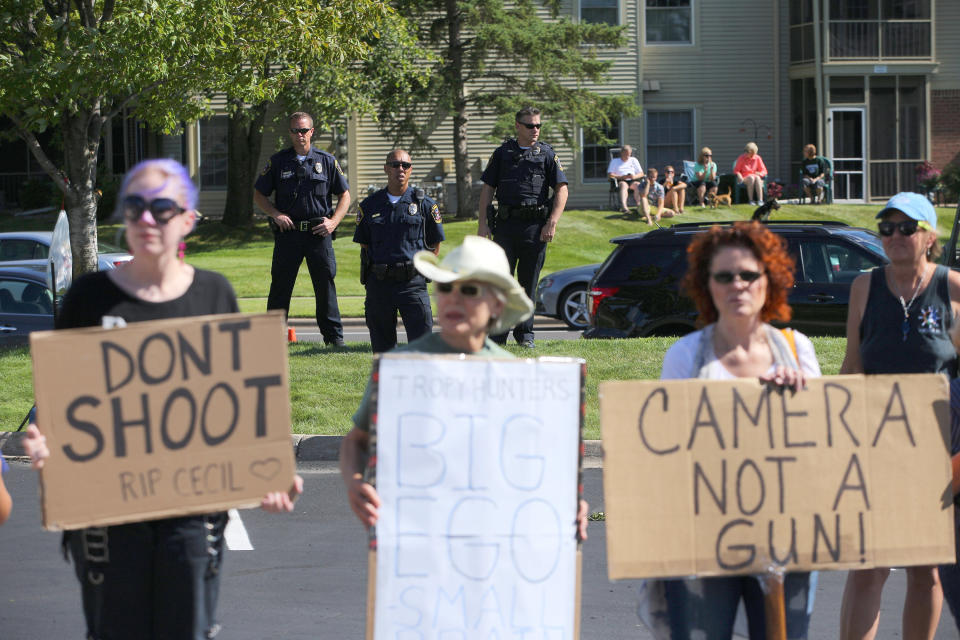 Protesters came out to shed light on poaching after Cecil was killed. (Photo: Adam Bettcher via Getty Images)