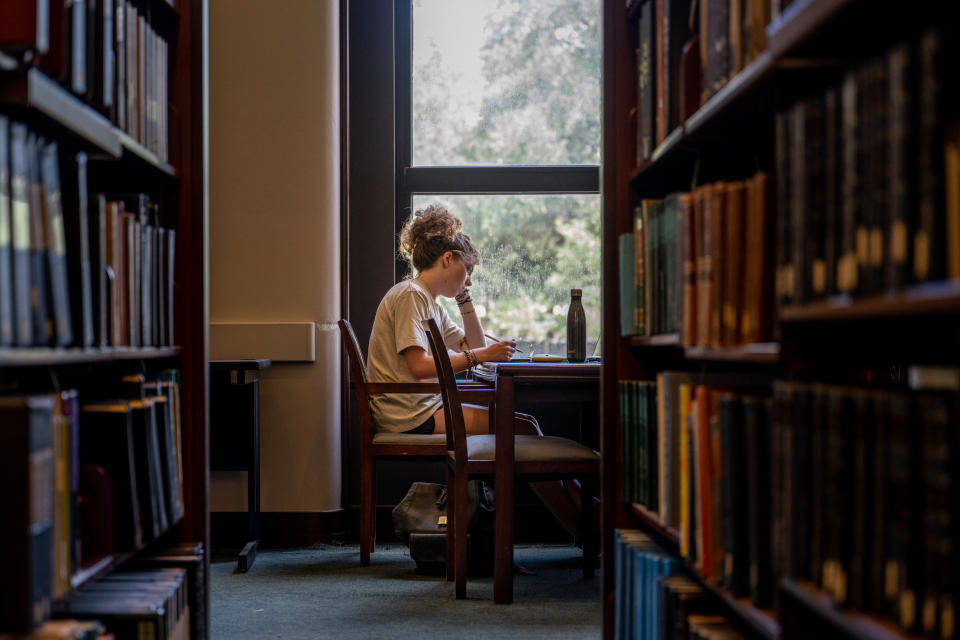 HOUSTON, TEXAS - AUGUST 29: Bio Scientist major Emma Scales studies in the Rice University Library on August 29, 2022 in Houston, Texas. U.S. President Joe Biden has announced a three-part plan that will forgive hundreds of billions of dollars in federal student loan debt. Since announced, the plan has sparked controversy as critics have begun questioning its fairness, and addressing concerns over its impact on inflation. (Photo by Brandon Bell/Getty Images)