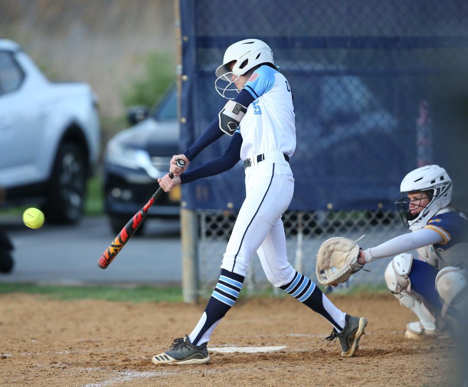 John Jay's Camryn O'Connor swings at a pitch against Mahopac during an April 24, 2023 softball game.
