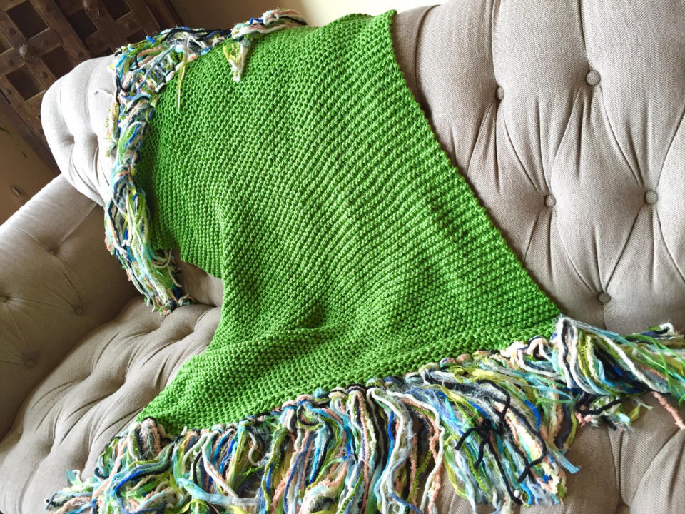 <a href="https://www.etsy.com/listing/96711638/colorful-knitted-throw-blanket-in?ga_order=most_relevant&amp;ga_search_type=all&amp;ga_view_type=gallery&amp;ga_search_query=emerald&amp;ref=sr_gallery_1" target="_blank">Shop it here for $275.</a>