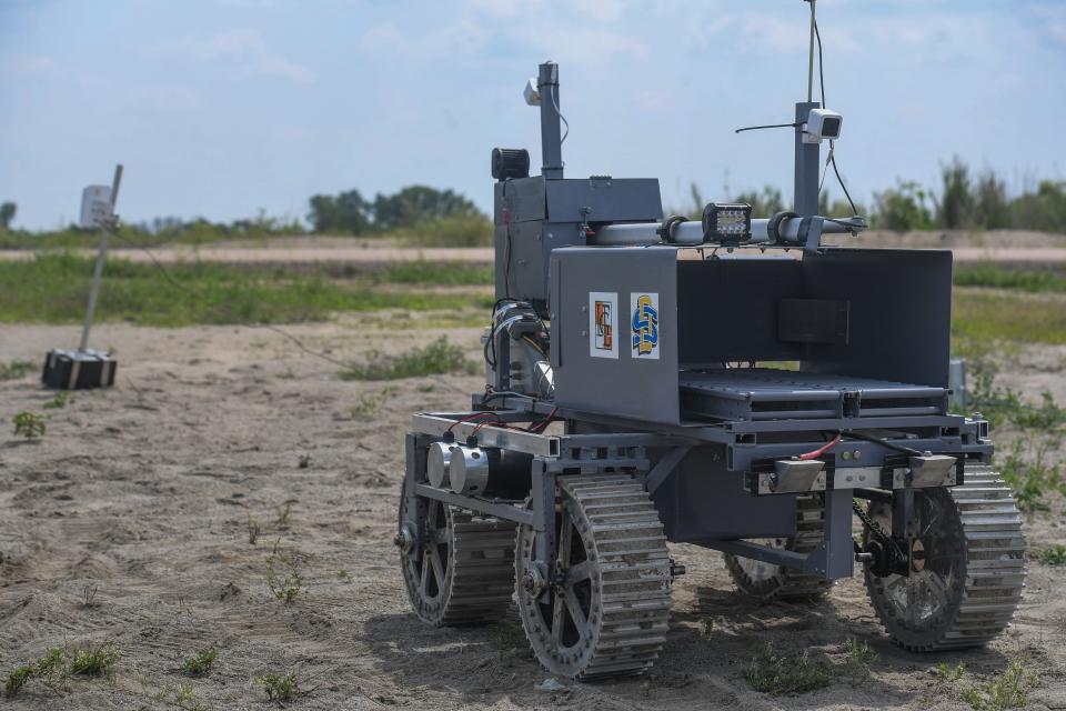 South Dakota State University team Space Trajectory's battery-swapping rover moves around during NASA's Break the Ice challenge in Brookings, South Dakota on Wednesday, Aug. 9, 2023.