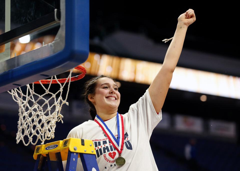 Sacred Heart’s Angelina Pelayo celebrates her piece of the net after they beat McCracken County in the Mingua Beef Jerky Sweet 16 Girl’s Basketball Championship. 
Mar. 16, 2024