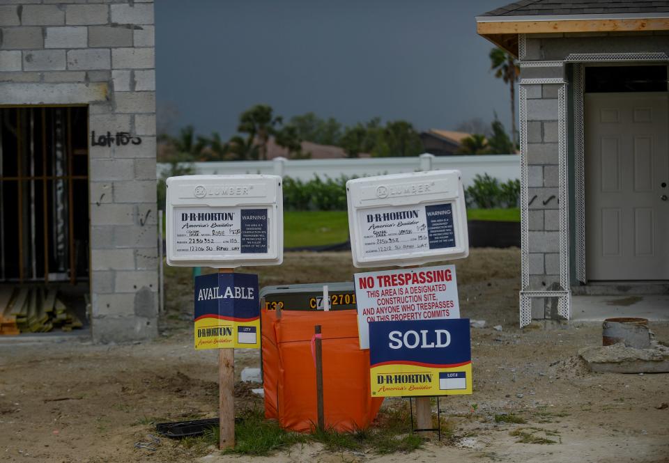 New Houses are seen under construction along Rimini Way in the Central Park neighborhood on Monday, March 13, 2023, in Port St. Lucie. Houses are sold while under construction in the fast developing neighborhood.