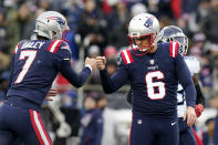 New England Patriots kicker Nick Folk (6) is congratulated by holder Jake Bailey after a field goal during the first half of an NFL football game against the Tennessee Titans, Sunday, Nov. 28, 2021, in Foxborough, Mass. (AP Photo/Steven Senne)