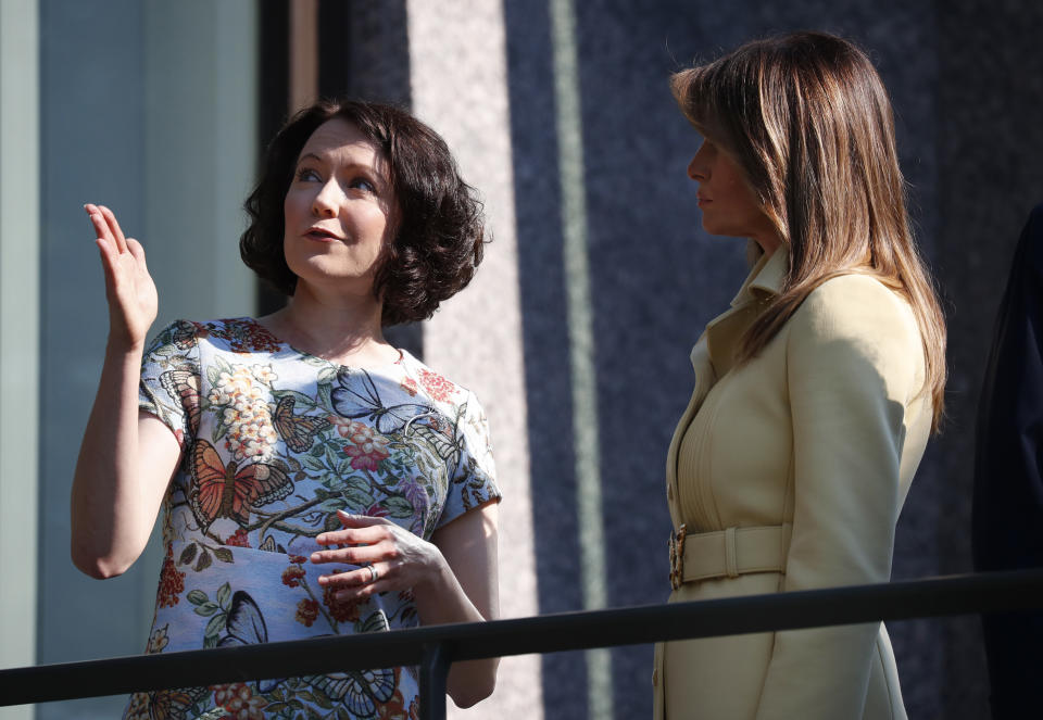 Both first ladies wore butterfly-themed outfits. (Photo: AP Photo/Pablo Martinez Monsivais)