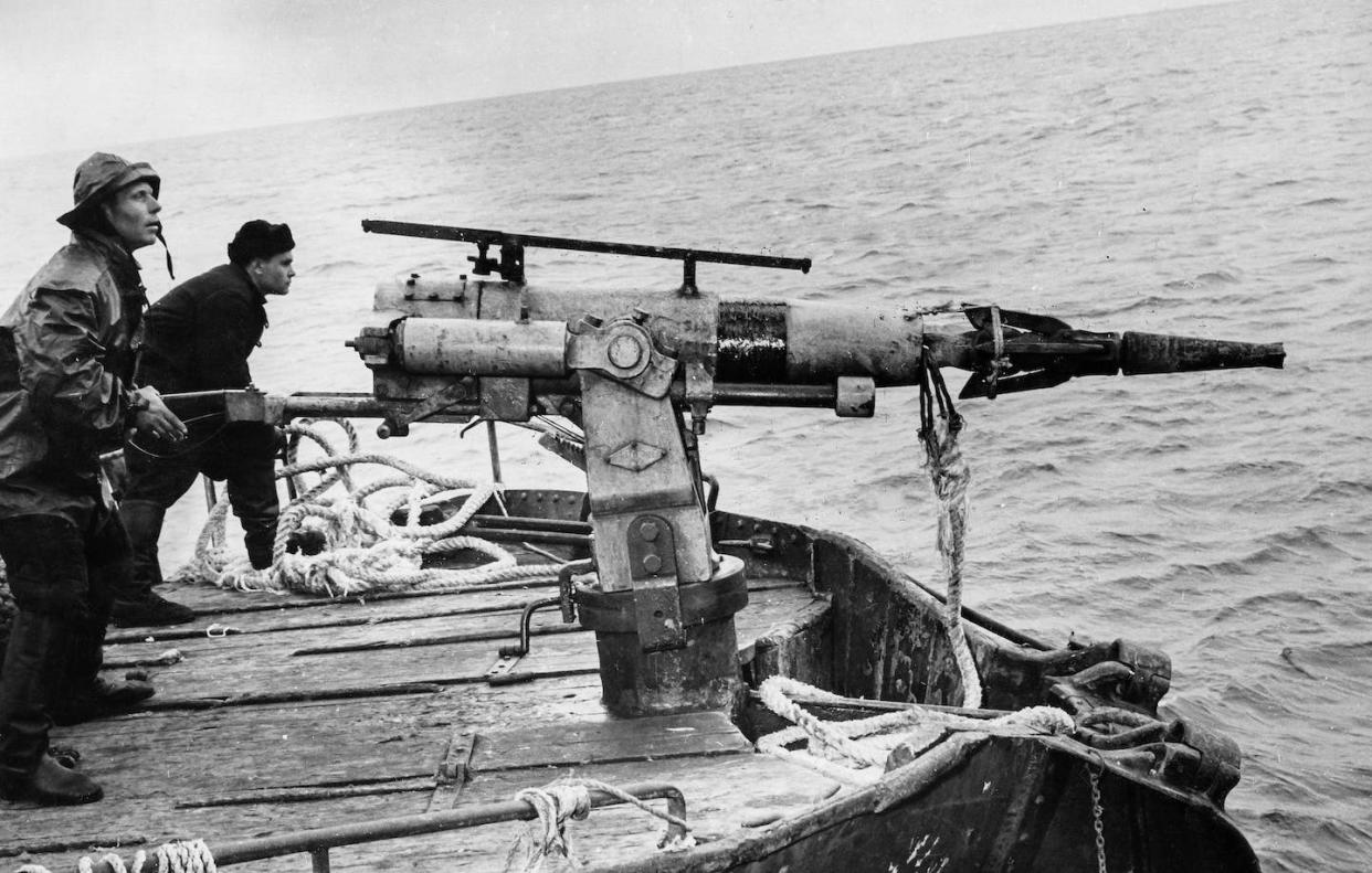 Soviet whalers manning mechanized harpoons in 1960. <a href="https://www.gettyimages.com/detail/news-photo/whalers-russia-1960-news-photo/1205993604" rel="nofollow noopener" target="_blank" data-ylk="slk:Marka/Universal Images Group via Getty Images;elm:context_link;itc:0;sec:content-canvas" class="link ">Marka/Universal Images Group via Getty Images</a>