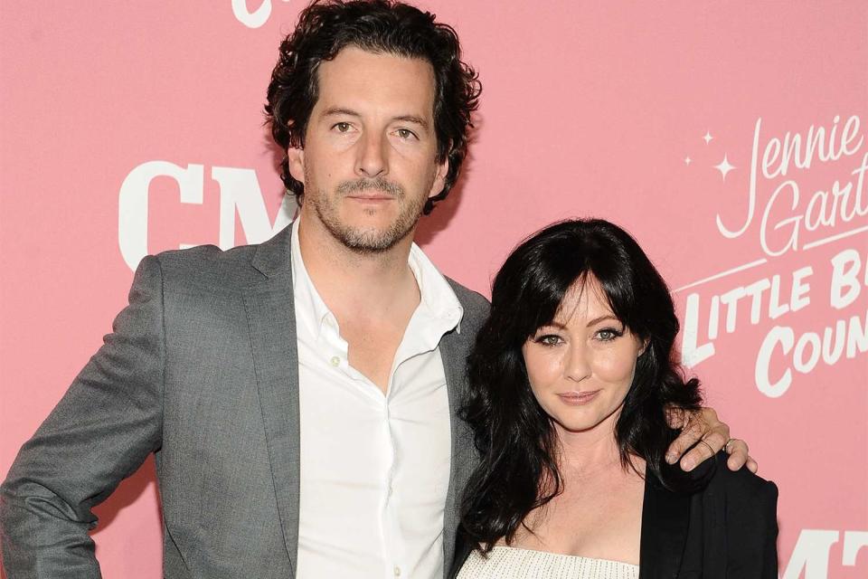 Angela Weiss/Getty Shannen Doherty and Kurt Iswarienko