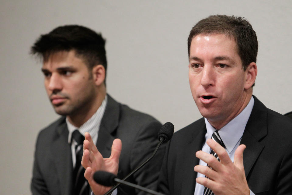 <p> American journalist Glenn Greenwald, right, speaks to a congressional committee investigating reports based on documents, leaked by former National Security Agency contractor Edward Snowden, showing that Brazil was targeted by spy agencies from the U.S., Britain and Canada, at Congress in Brasilia, Brazil, Wednesday, Oct. 9, 2013. At left his Greenwald's partner David Miranda. Greenwald, the who broke the first stories about the NSA's global spy program, told the committee that the U.S. government "lies" when it says that the aim of the NSA spy program is to combat terrorism. (AP Photo/Eraldo Peres)</p>