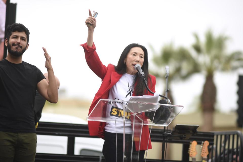 Jodi Long speaks during a rally